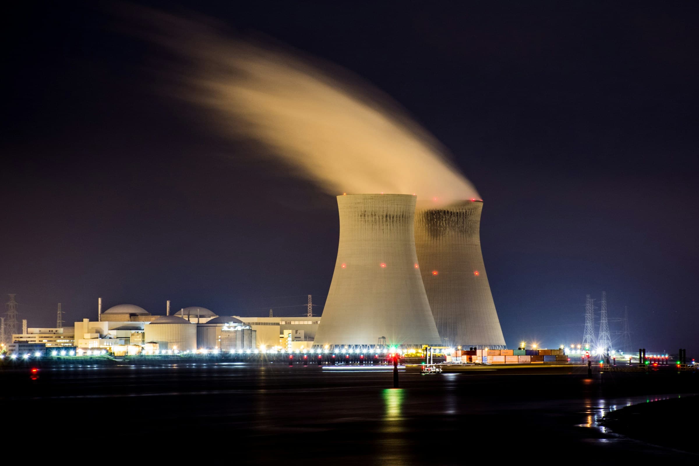 Nuclear cooling tower silhouetted at twilight