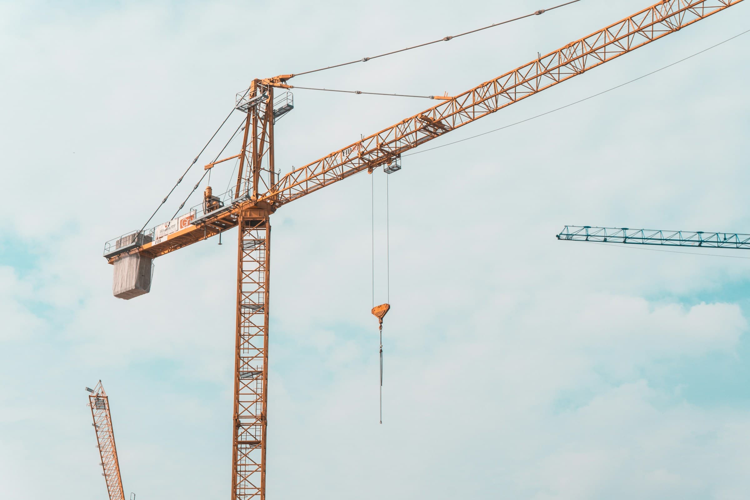 Mobile crane performing a heavy industrial lift
